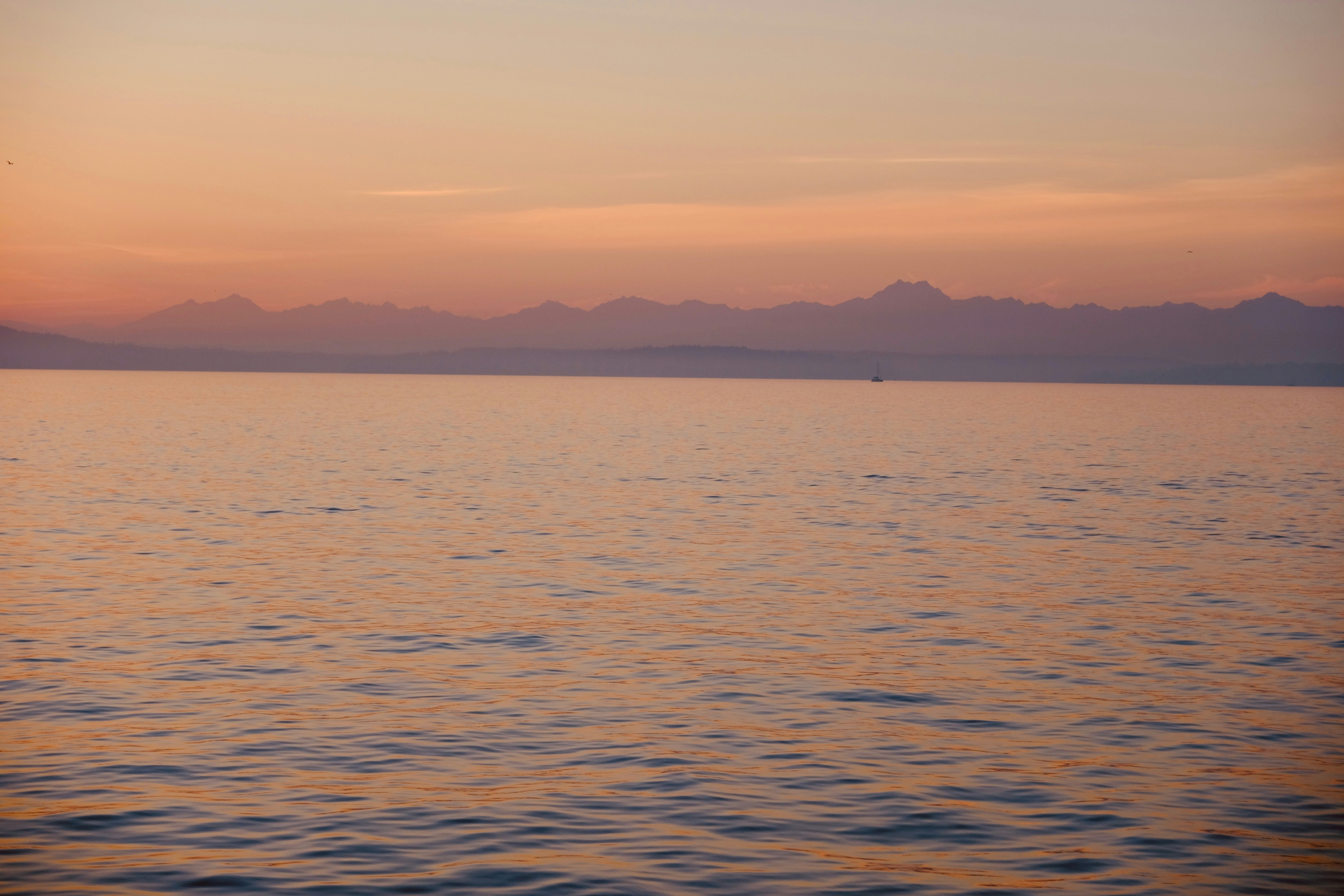 Sunset Over The Lake With Mountains In The Distance 6K wallpaper for Apple iPhone, Apple Watch, Mac, iPad and Apple Watch