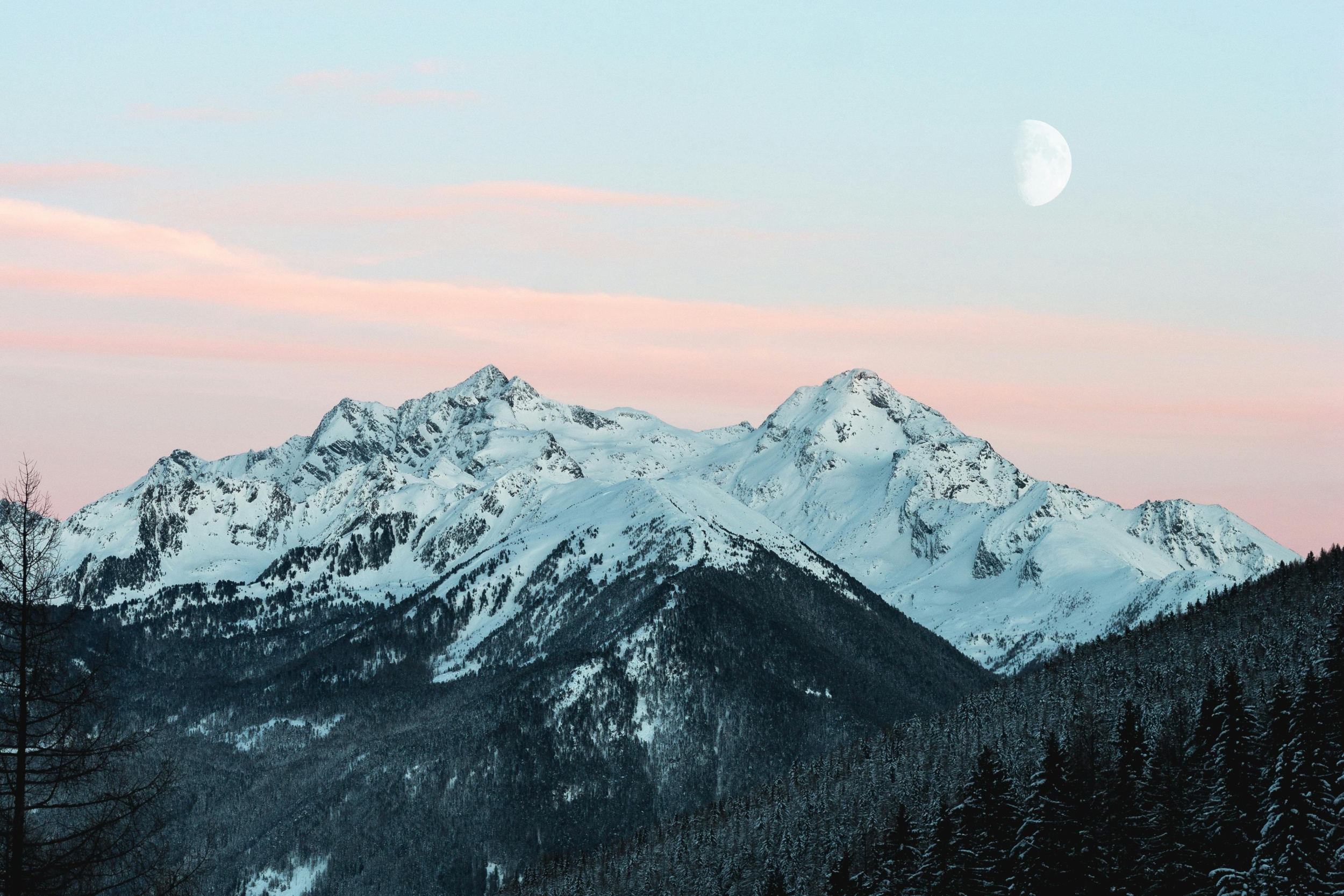 The Sun Rises Over Snowcapped Mountains 7k wallpaper for Apple iPhone, Apple Watch, Mac, iPad and Apple Watch