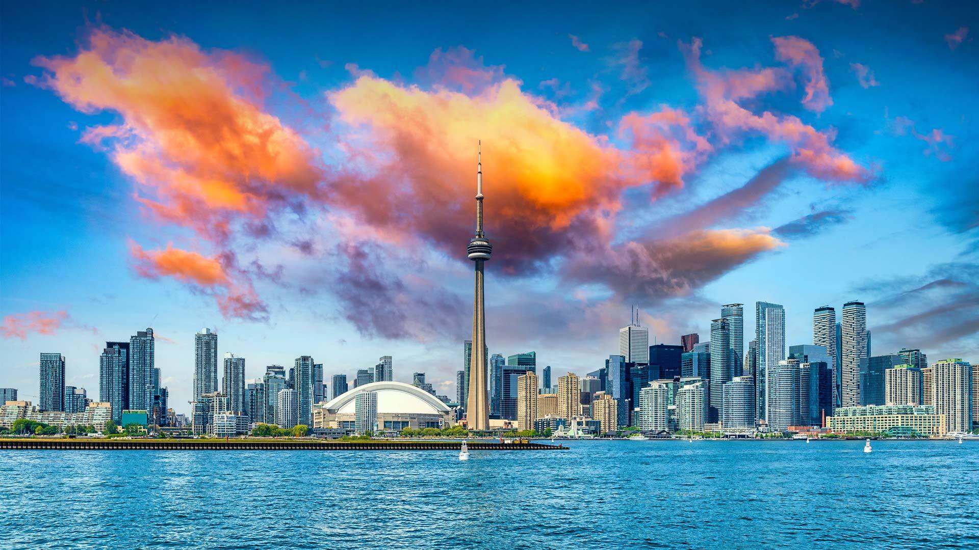 Toronto City Lake Ontario Canada CN Tower Skyline Sunrise Orange Clouds