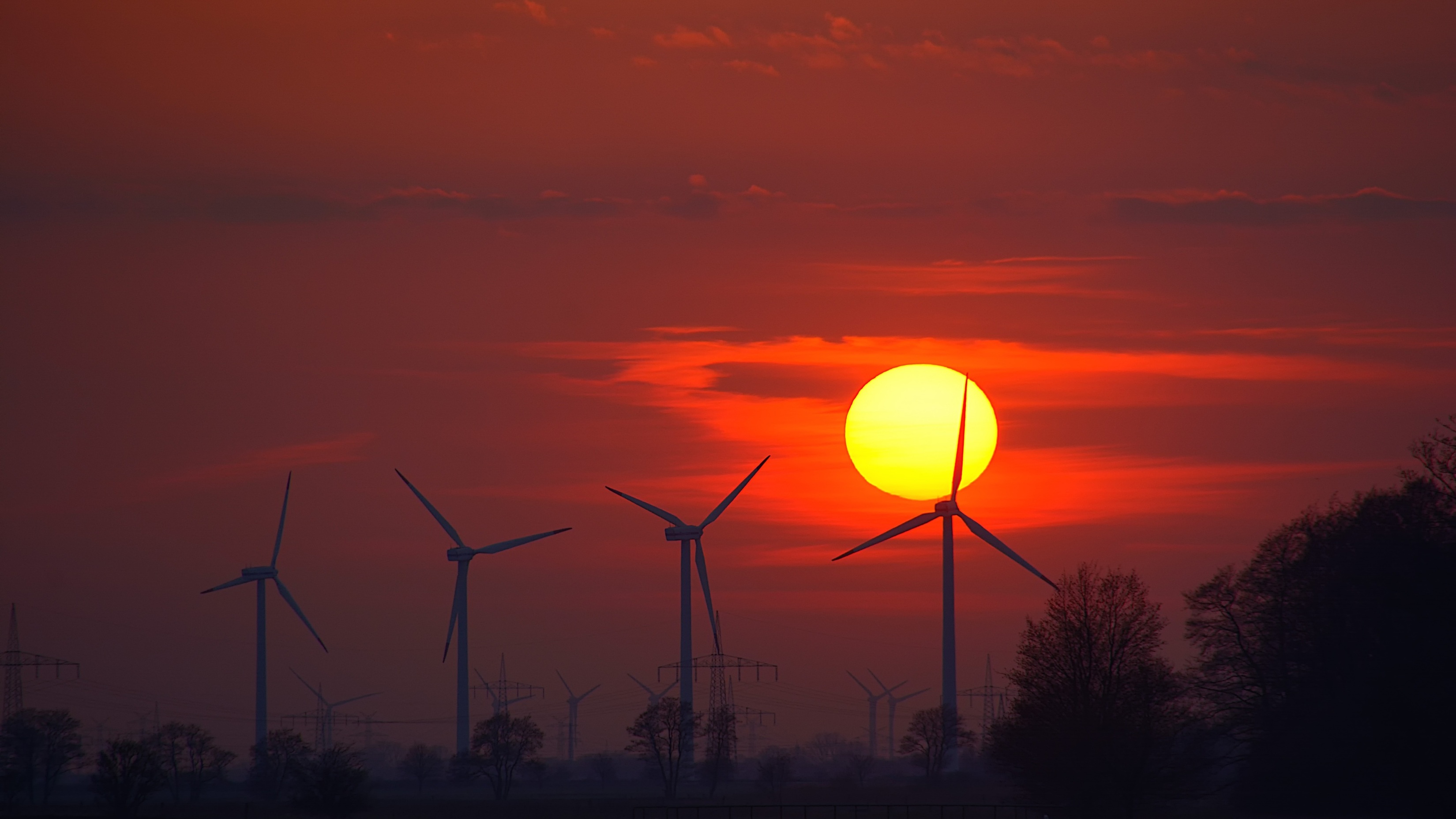 Wind Turbines Evening Sunlight Energy Sunset 4K wallpaper for Apple iPhone, Apple Watch, Mac, iPad and Apple Watch